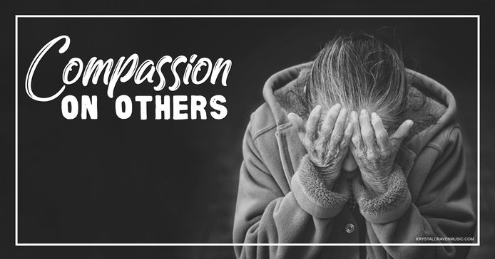The devotional title text of "Compassion on Others" overlaying an older woman wearing a coat with her face in her hands, on a black background.