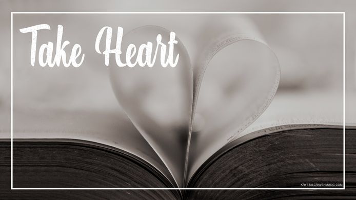 Devotional title text overlaying an open book with pages folded in towards the center to make the shape of a heart with the pages.