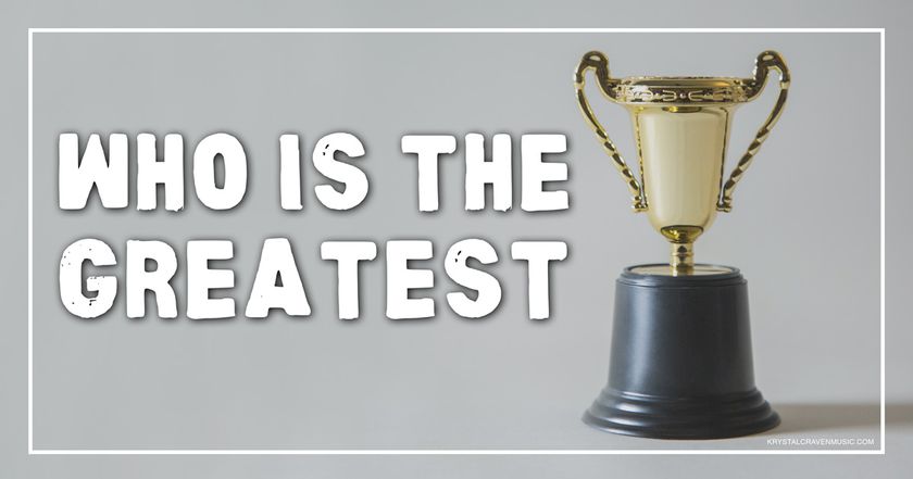 The title text "Who Is The Greatest" in a bold white font on a gray background to the left of a trophy.