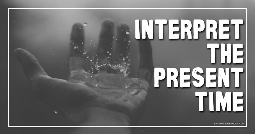 The title text "Interpret The Present Time" over a hand palm up and with fingers lightly curled upward with water splashing from the palm.