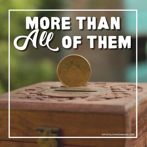 A coin standing on edge on top of a wooden box with the words "More Than All of Them" appearing above it.